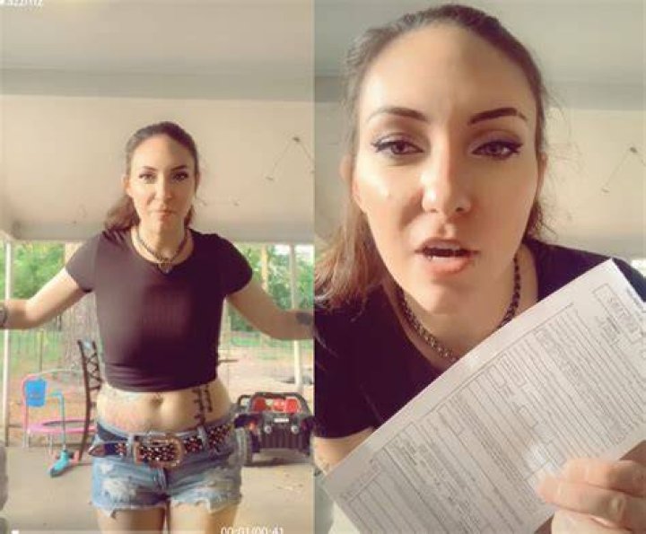 Indecent exposure: The woman was caught on camera by a passerby running down the road and past a McDonald's in New Orleans as a police cruiser trailed her