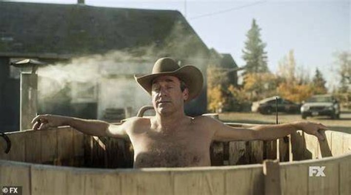 Outdoors tub: Sheriff Roy Tillman, played by 52-year-old Jon, was shown soaking in an outdoors hot tub with nipple rings showing