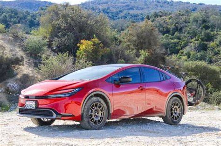 Prius PRIME lifted with the 2" inch lift kit looks ready for battle
