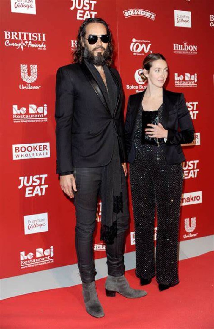 Russell Brand expecting third child with wife Laura Gallacher