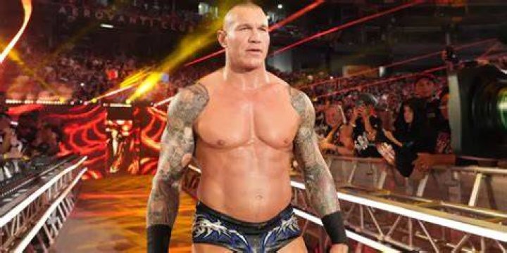 WWE Superstar Randy Orton and his wife Kim Kessler Orton arriving at